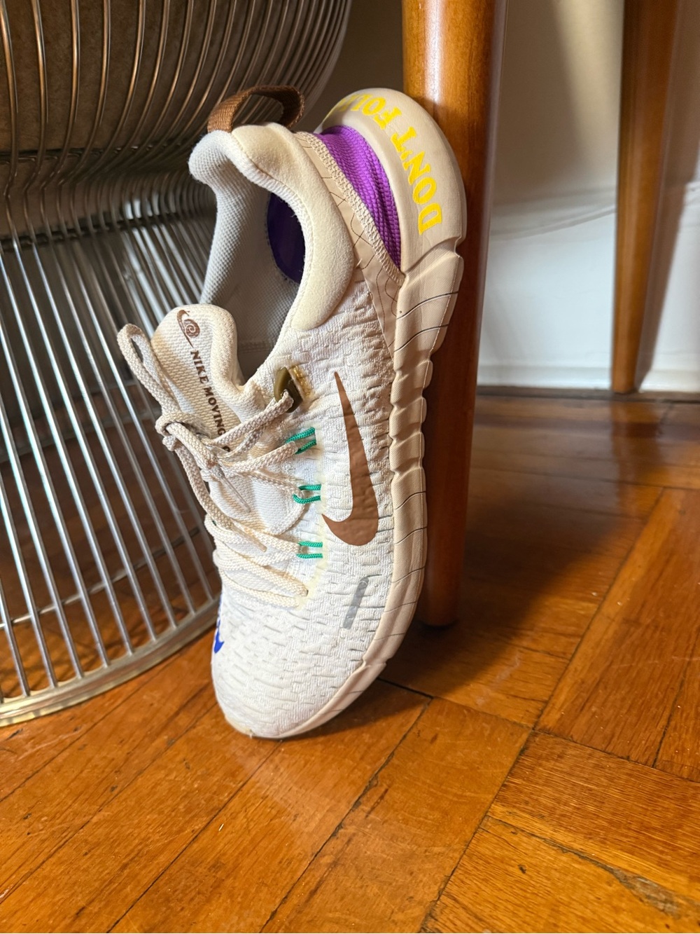 Nike Women's Cream Athletic Shoe with Purple & Yellow Accents